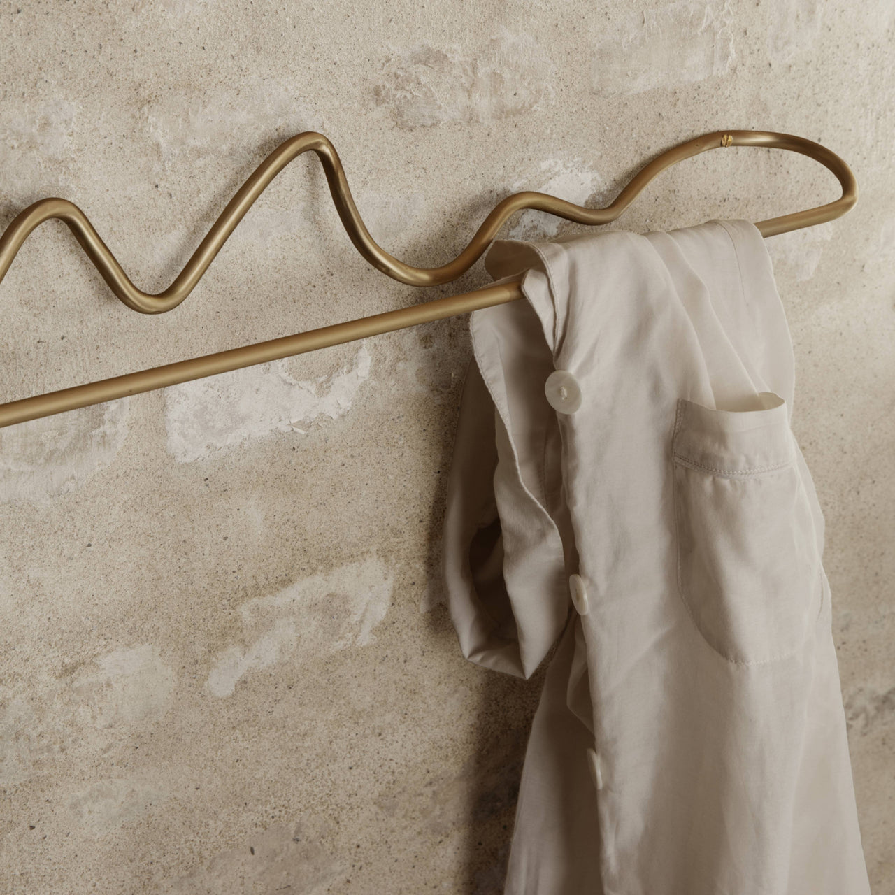 Curvature Towel Hanger